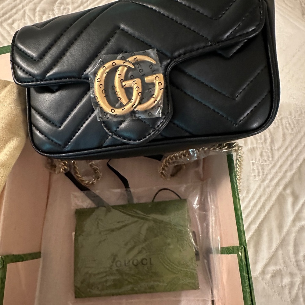 Gucci Black Quilted Crossbody Bag with Gold Accents